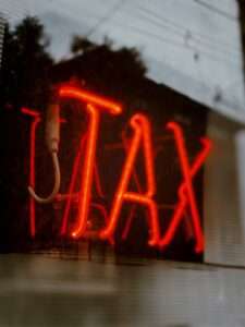 Sign that reads "tax"
