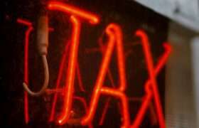 Sign that reads "tax"