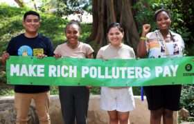 Global climate activists rally at Baku’s Olympic stadium with bold “Pay Up!” message