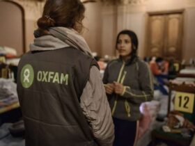 Displaced Ukraine woman fled to Poland for safety - talking to Oxfam staff