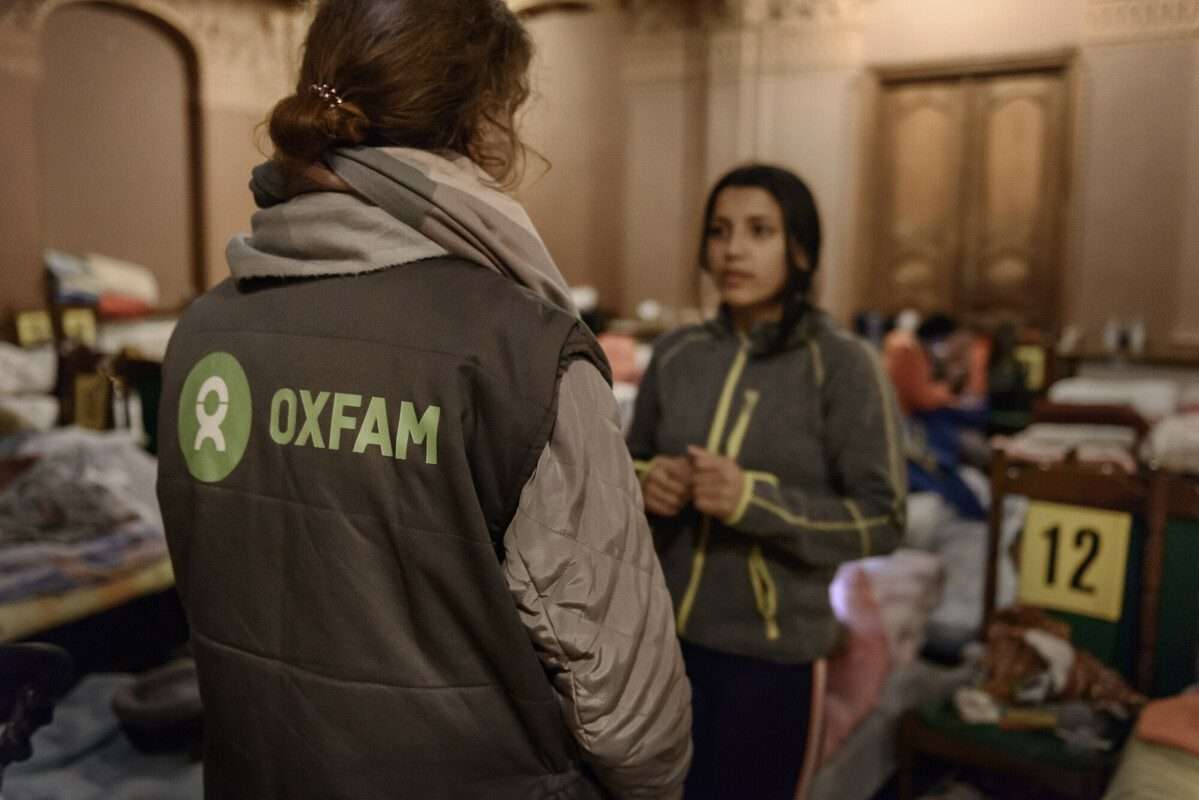 Displaced Ukraine woman fled to Poland for safety - talking to Oxfam staff