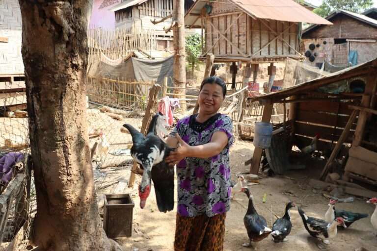 Lao woman at her chicken farm